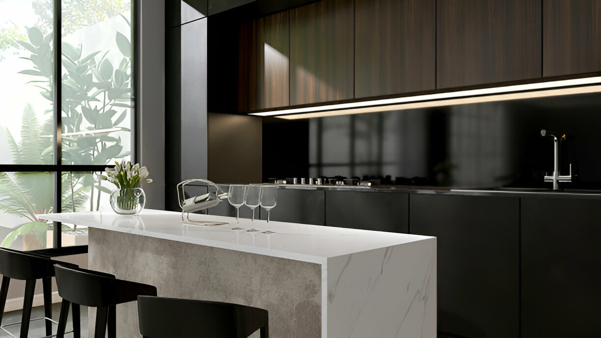 Minimalist kitchen with black cabinetry and white marble island