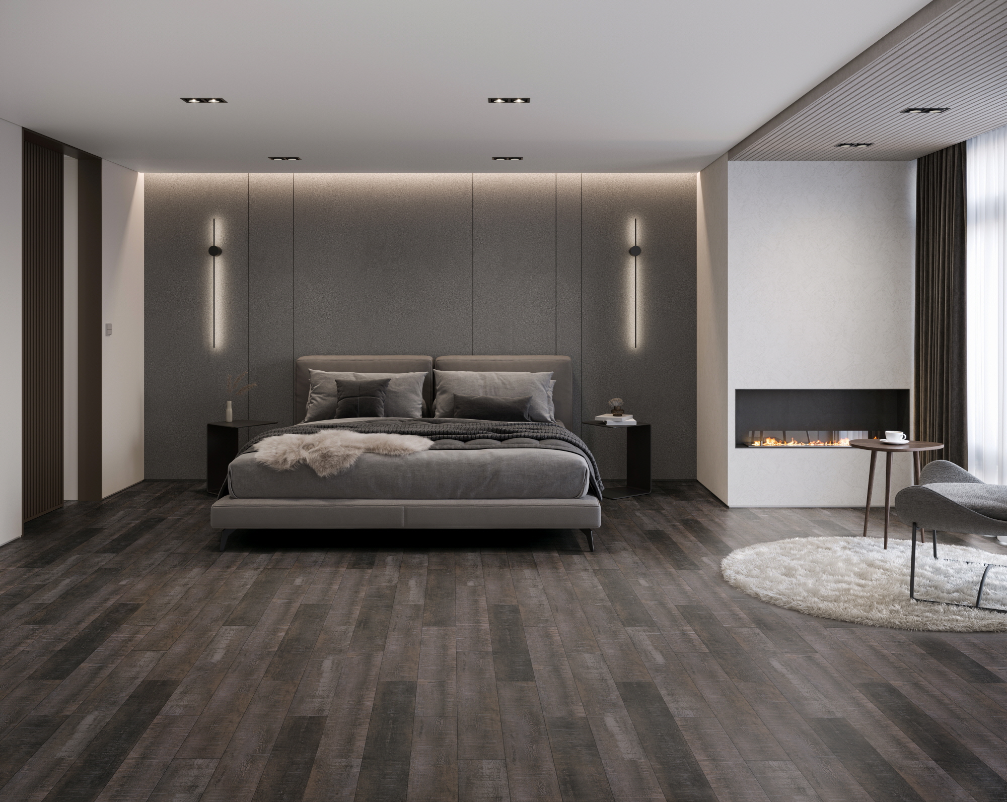 Contemporary bedroom with dark hazy oak LVT flooring, upholstered bed, ambient wall lighting, and a built-in fireplace