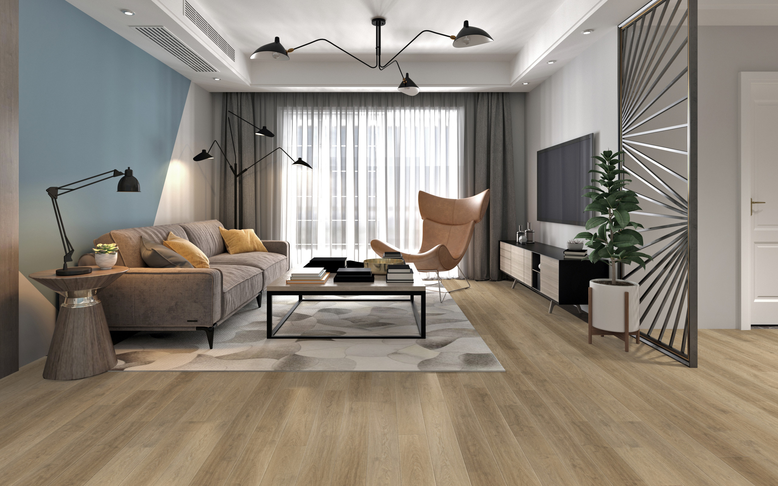 Modern living room with wood flooring, neutral furniture, and accent wall